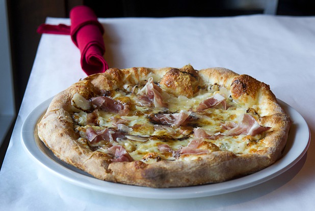 A Cal Italia pizza is displayed at the new Pizza Rock restaurant at Third Street and Ogden Avenue in downtown Las Vegas Thursday, Oct. 17 2013.