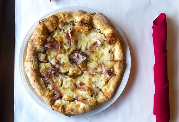 A Cal Italia pizza is displayed at the new Pizza Rock restaurant at Third Street and Ogden Avenue in downtown Las Vegas Thursday, Oct. 17 2013.