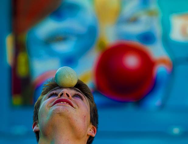 Circus Vargas juggler Michael Ferreri continues to one his craft as the big top is erected at the Galleria on Sunset Tuesday, Oct. 15, 2013.  L.E. Baskow.