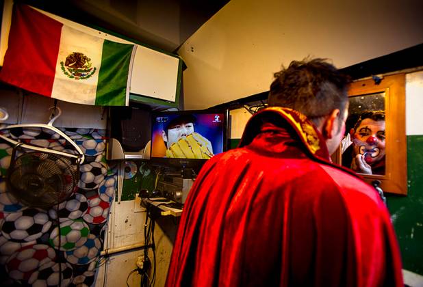 Circus Vargas clown Matti Esqueda touches up his makeup in his trailer during an opening night performance Thursday Oct. 17, 2013.  L.E. Baskow.