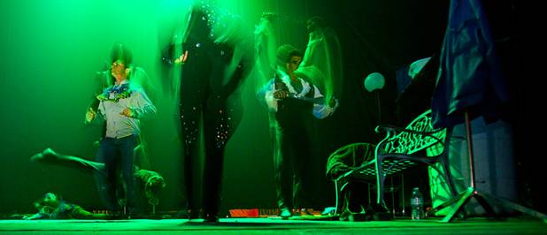 Circus Vargas performers warm up backstage under the dim work lights preparing for their opening night show Thursday Oct. 17, 2013.  L.E. Baskow.