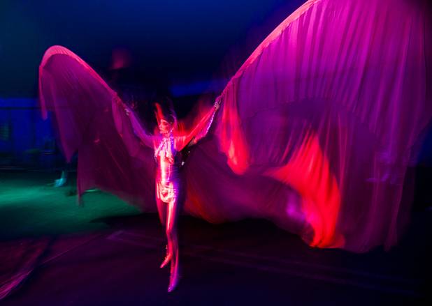 A Circus Vargas cast member readies giant silk wings backstage as the opening act begins at the Galleria on Sunset Thursday, Oct. 17, 2013.  L.E. Baskow.