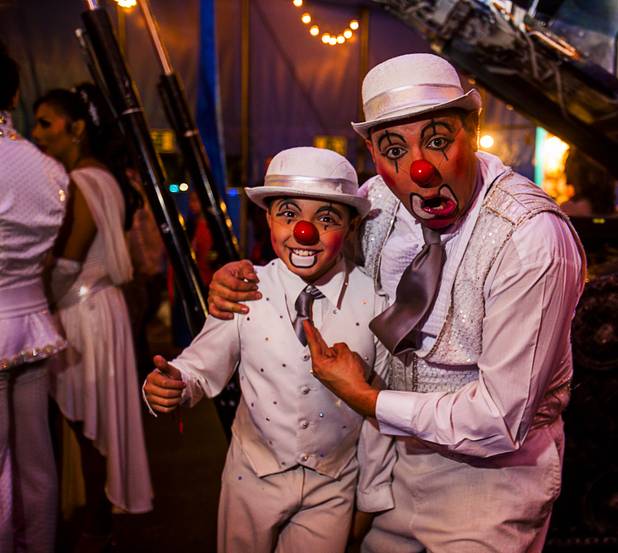 Circus Vargas clowns Matti Esqueda (right) and son Armi play around following their opening night performance at the Galleria on Sunset  Thursday, Oct. 17, 2013.  L.E. Baskow.
