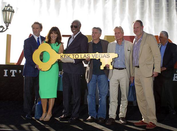 Cast members of "Last Vegas" and director Jon Turteltaub, right, pose during a ceremony in front of the Bellagio Friday, Oct. 18, 2013. Actors from left: Kevin Kline, Mary Steenburgen, Morgan Freeman, Robert De Niro, and Michael Douglas. Las Vegas Mayor Carolyn Goodman and Clark County Commission Chairman Steve Sisolak (far right) declared Oct. 18, 2013 to be "Last Vegas Day" in Las Vegas and Clark County. The movie by CBS Films opens nationwide on November 1.