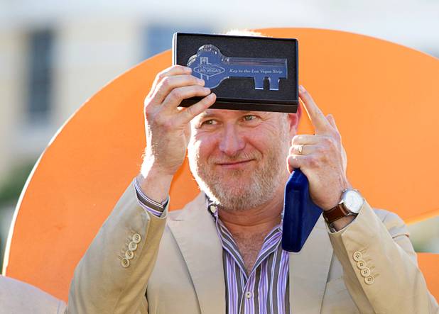 Director Jon Turteltaub holds the "Key To the Las Vegas Strip" during a ceremony for Turteltaub and cast members of "Last Vegas" in front of the Bellagio Friday, Oct. 18, 2013. It was the first time for the Clark County to present a key. Las Vegas Mayor Carolyn Goodman and Clark County Commission Chairman Steve Sisolak declared Oct. 18, 2013 to be "Last Vegas Day" in Las Vegas and Clark County. The movie by CBS Films opens nationwide on November 1.