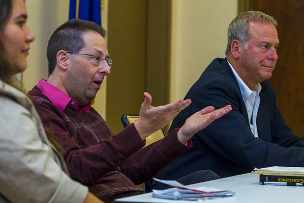 Panelist Michael Green (center) with Gregan Wingert (left) and Brian Greenspun (right) responds to a question from a member attending the Las Vegas pro chapter Society of Professional Journalists panel discussion at the Nevada State Museum at the Springs Preserve Saturday, Oct. 19, 2013.