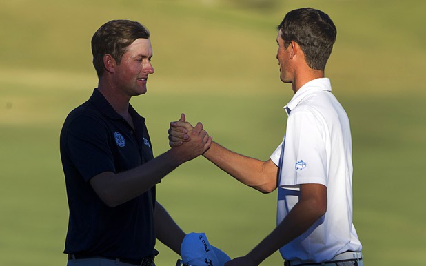Webb Simpson (L) of Charlotte, N.C. is congratulated by Chesson Hadley of Raleigh, N.C. after winning the Shriners Hospitals for Children Open at TPC Summerlin Sunday Oct. 20, 2013.