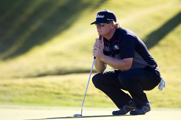 Former UNLV golfer Charley Hoffman waits to putt on the 16th green during the Shriners Hospital for Children Open at TPC Summerlin Sunday Oct. 20, 2013. Hoffman had the best finish of locals, carding a 7-under today to take fourth at 17-under for the tournament.