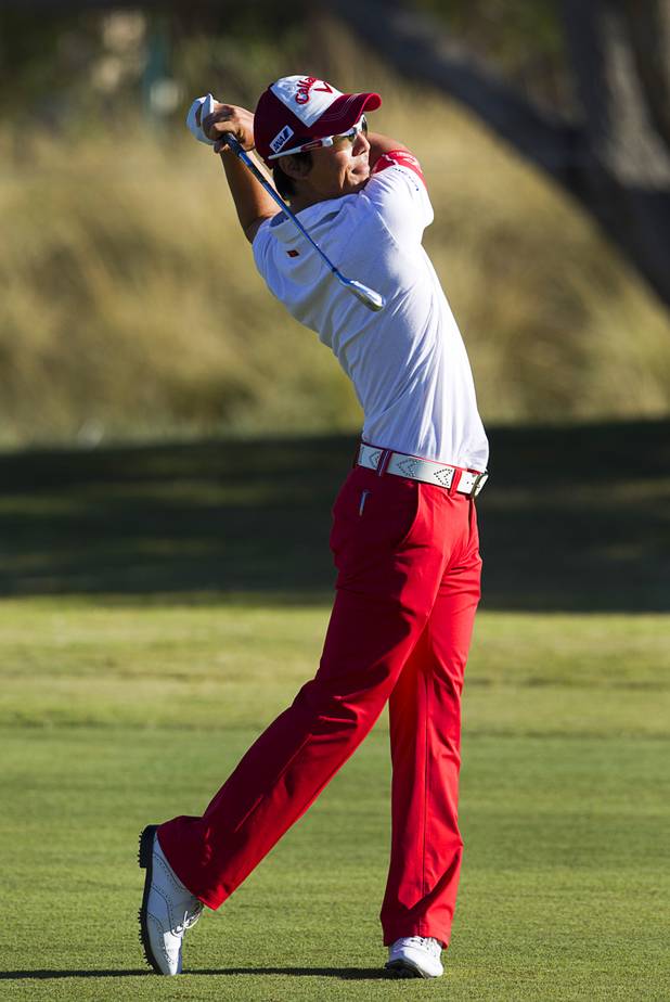 Ryo Ishikawa of Japan hits from the 16th fairway during the Shriners Hospital for Children Open at TPC Summerlin Sunday Oct. 20, 2013.