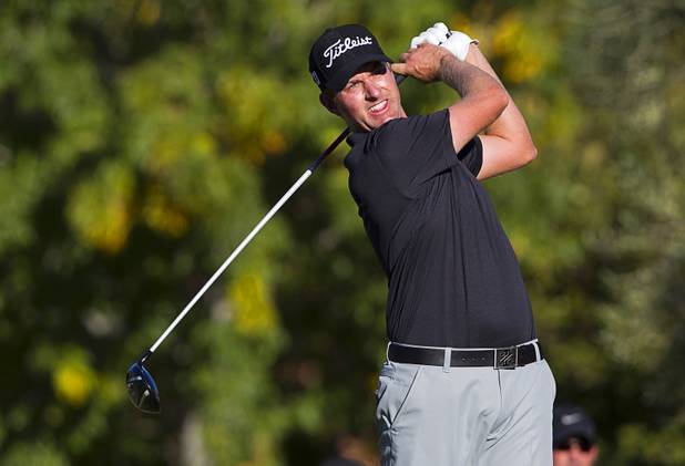 Webb Simpson of Charlotte, N.C. drives off the 16th tee during the Shriners Hospital for Children Open at TPC Summerlin Sunday Oct. 20, 2013. Simpson ties tourney record to win Shriners Open by six strokes.