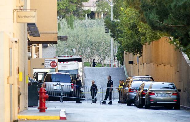 Hotel security officers secure an area on the north side of  Planet Hollywood after an employee discovered a dead baby in a trash bin outside the hotel Monday, Oct. 21, 2013.