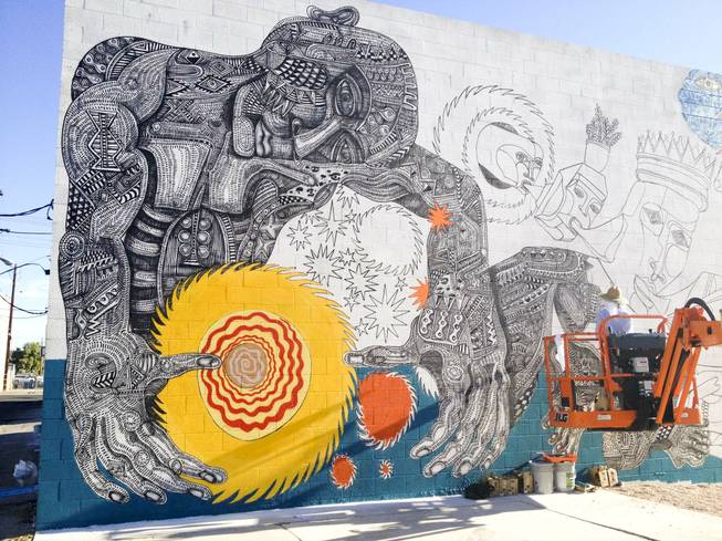 A mural for the 'Life is Beautiful' festival in mid progress in downtown Las Vegas as seen on Monday, Oct. 21, 2013.