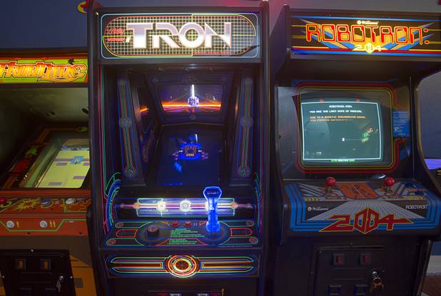 Arcade games are shown in Craig Snelling's game room Tuesday, Oct. 22, 2013. Snelling is a pinball machine repairman and owner of Billiards 'N More, a billiards and game room supply store.