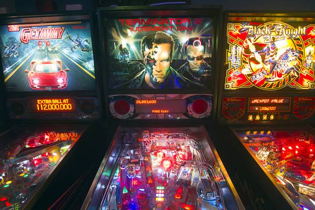 Pinball machines are shown in Craig Snelling's game room Tuesday, Oct. 22, 2013. Snelling is a pinball machine repairman and owner of Billiards 'N More, a billiards and game room supply store.