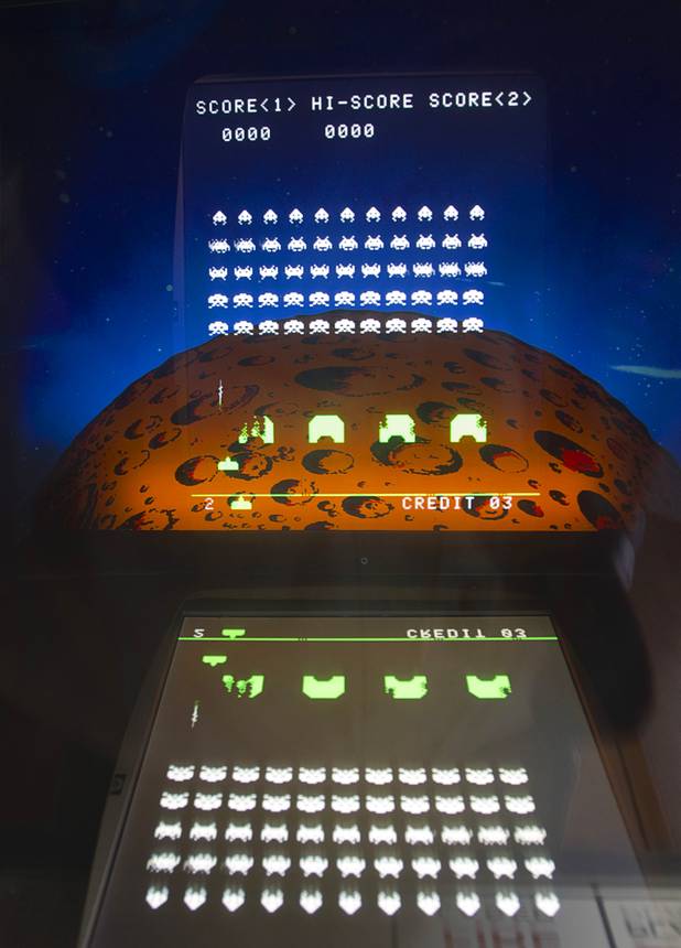 A "Space Invaders" video game is shown in Craig Snelling's game room Tuesday, Oct. 22, 2013.