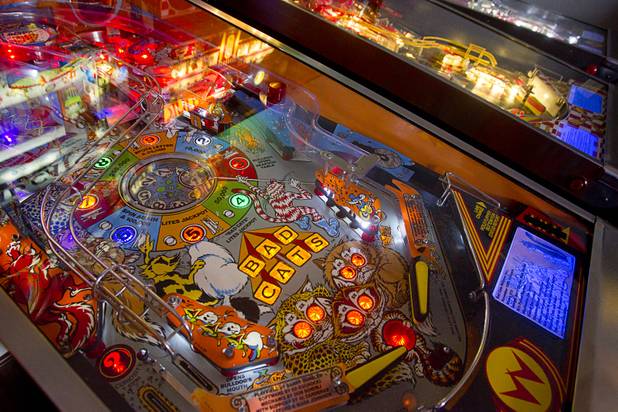A Williams  "Bad Cats" pinball machine is shown in Craig Snelling's game room Tuesday, Oct. 22, 2013.