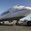In this Monday, Dec. 10, 2012, file photo, Lufthansa's Boeing 747-8 Brandenburg aircraft arrives at Los Angeles International Airport, after its inaugural passenger flight from Frankfurt, Germany to Los Angeles. For decades, the Boeing’s 747 was the Queen of the Skies. But the glamorous double-decker jumbo jet that revolutionized air travel and shrunk the globe could be nearing the end of the line.