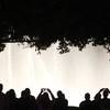 People watch the fountain show at the Bellagio on the Strip Friday, Oct. 25, 2013.