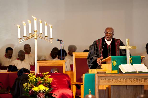Elder Jewel Dewity leads church members in prayer during the morning service at the First African Methodist Episcopal Church in Las Vegas on Sunday, Oct. 27, 2013.
