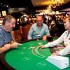 Steve Shannon, left, and Frank Smolinski, visiting from Ohio, play a hand of blackjack during the opening of the Downtown Grand Las Vegas Hotel and Casino in Las Vegas Sunday, October 27, 2013.