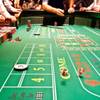 Dice roll across the craps table during the opening of the Downtown Grand Las Vegas Hotel and Casino in Las Vegas Sunday, October 27, 2013.