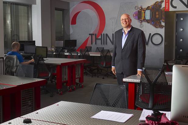 Ben Jones, vice president/director of sales for Jennifer Web Design, poses in the company's workspace in the Switch inNEVation Center Monday, Oct. 28, 2013.
