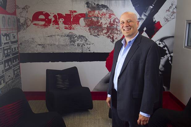 Ben Jones, vice president/director of sales for Jennifer Web Design, poses in a conference room at the Switch inNEVation Center Monday, Oct. 28, 2013.