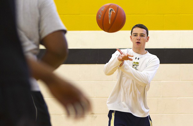 Payton Dickerson passes the ball during intramurals at Clark High School Wednesday, Oct. 30, 2013.