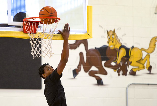 Darius Jackson lays up the ball during intramurals at Clark High School Wednesday, Oct. 30, 2013.