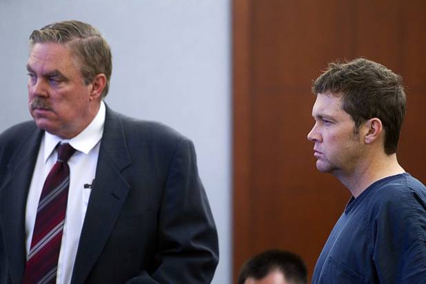Benjamin Frazier, 41, appears in court at the Regional Justice Center Wednesday, Oct. 30, 2013. Attorney Bob Beckett is at left. Frazier is accused of shooting two security guards and a patron outside the Drai's after-hours club in Bally's on Oct. 21, 2013.