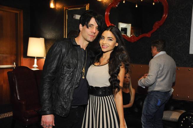 Criss Angel, with fiancee Sandra Gonzalez, celebrates the fifth anniversary of his Cirque du Soleil show “Believe” at the Luxor on Wednesday, Oct. 30, 2013, at a party at Rx Boiler Room in Mandalay Place.
