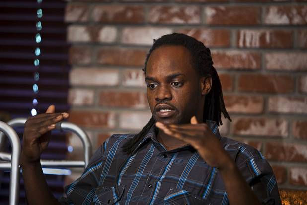 Antoine Hodges explains how an officer confronted him and mistakenly shot him at a convenience store recently during a news conference at his attorney's office on Friday  Nov. 1, 2013.