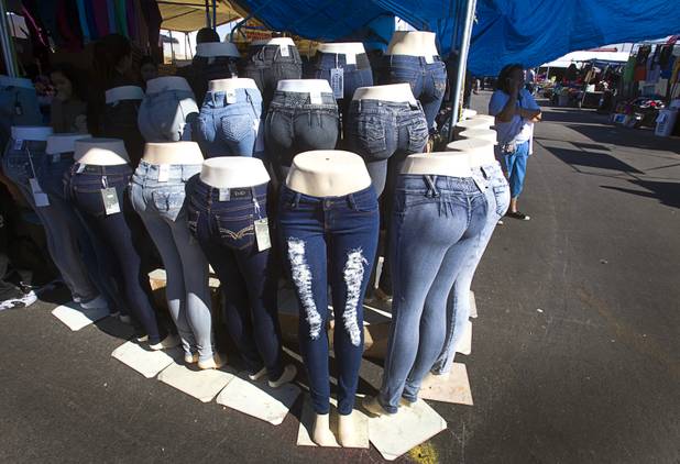 Women's jeans are displayed at the Broadacres Marketplace & Events Center Sunday Nov. 3, 2013.