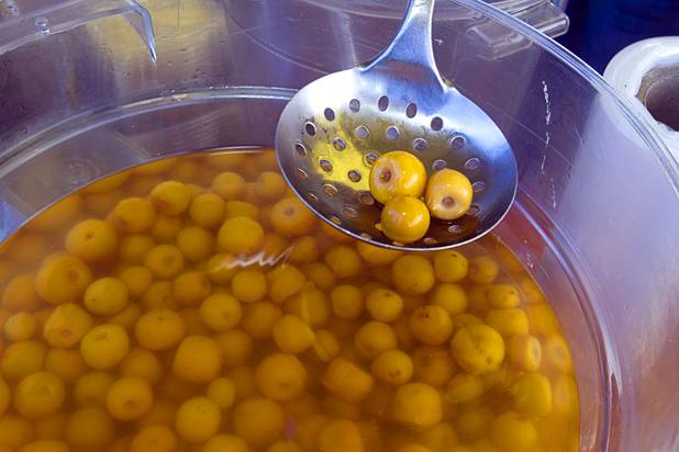 Nanchis (or nanches) are displayed at the Broadacres Marketplace & Events Center Sunday Nov. 3, 2013. The fruit is popular in Mexico and Central America where it is eaten raw or cooked as a dessert. It is also used in flavoring beverages.