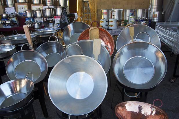Large pots and pans are displayed at the Broadacres Marketplace & Events Center Sunday Nov. 3, 2013.