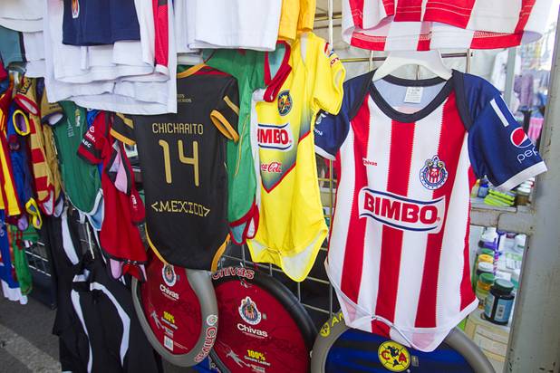 Soccer jerseys are displayed at the Broadacres Marketplace & Events Center Sunday Nov. 3, 2013.
