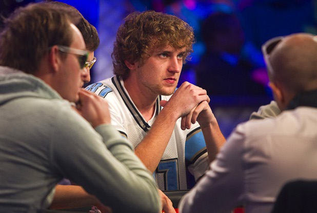 Ryan Riess, 23, a poker professional from East Lansing, Michigan who now resides in Las Vegas, competes during the final table of the World Series of Poker $10,000 buy-in no-limit Texas Hold 'Em tournament at the Rio Monday, Nov. 4, 2013. The 2013 "November Nine" are competing for a share of $26,662,046 of prize money including $8,359,531 for first place.