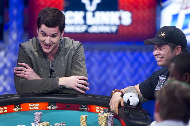 David Benefield, left, 27, a part-time student and part-time poker professional from New York City, reacts after going "all in" and losing to Jay Farber, right, during the final table of the World Series of Poker $10,000 buy-in no-limit Texas Hold 'Em tournament at the Rio Monday, Nov. 4, 2013. 