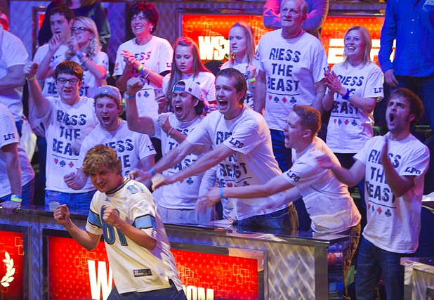 Ryan Riess, 23, celebrates with family and supporters after knocking out Michiel Brummelhuis, 32, during the final table of the World Series of Poker $10,000 buy-in, no-limit Texas Hold 'Em tournament at the Rio on Monday, Nov. 4, 2013. 