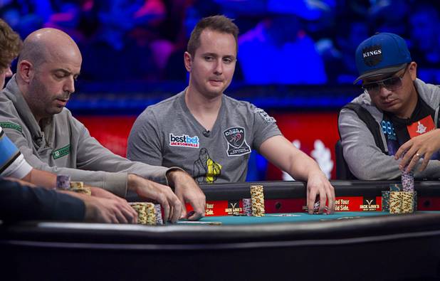 Marc-Etienne McLaughlin, 25, a poker player from Brossard, Quebec, Canada, competes during the final table of the World Series of Poker $10,000 buy-in no-limit Texas Hold 'Em tournament at the Rio Monday, Nov. 4, 2013.