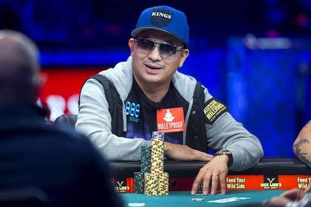 J.C. Tran, 36, a poker professional from Sacramento, Calif. competes during the final table of the World Series of Poker $10,000 buy-in no-limit Texas Hold 'Em tournament at the Rio Monday, Nov. 4, 2013.