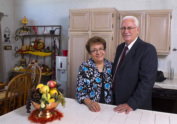 Gloria and Lanny Littlefield pose in the kitchen of their home in Henderson Tuesday, Nov. 5, 2013. The couple will leave soon for a LDS church leadership mission in Knoxville, Tenn.