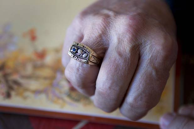 Lanny Littlefield shows a Pelican Bowl championship ring during an interview at his home in Henderson Tuesday, Nov. 5, 2013. The Pelican bowl was  NCAA Division II football bowl game between 1972 to 1975. Littlefield and his wife Gloria will leave soon for a LDS church leadership mission in Knoxville, Tenn.