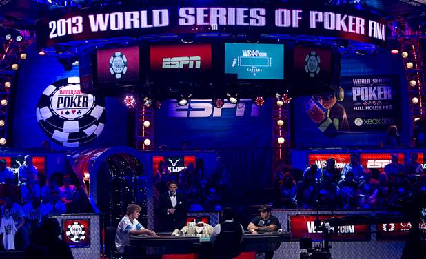 Ryan Riess, left, 23, a poker professional from East Lansing, Mich. and Jay Farber, a Las Vegas VIP Host originally from Santa Barbara, Calif., go head to head during the final table of the World Series of Poker $10,000 buy-in no-limit Texas Hold 'Em tournament at the Rio Tuesday, Nov. 5, 2013. The first place winner will take home $8,359,531 in prize money. 