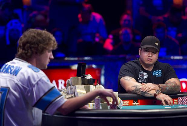 Jay Farber, right, 29, a Las Vegas VIP Host originally from Santa Barbara, Calif., and Ryan Riess, 23, a poker professional from East Lansing, Mich. go head to head during the final table of the World Series of Poker $10,000 buy-in no-limit Texas Hold 'Em tournament at the Rio Monday, Nov. 4, 2013.