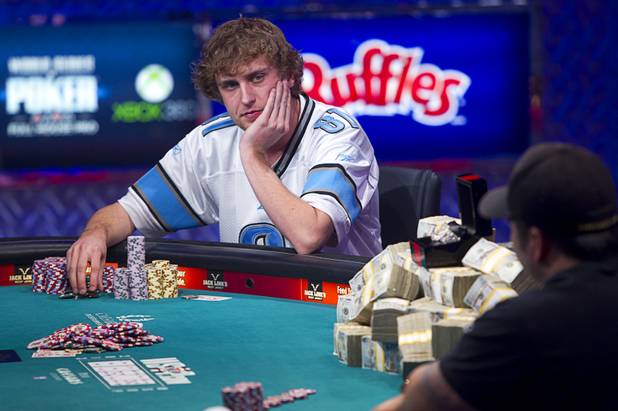 Ryan Riess, 23, a poker professional from East Lansing, Mich. contemplates a move against Jay Farber, 29, a Las Vegas VIP Host originally from Santa Barbara, Calif., during the final table of the World Series of Poker $10,000 buy-in no-limit Texas Hold 'Em tournament at the Rio Monday, Nov. 4, 2013.