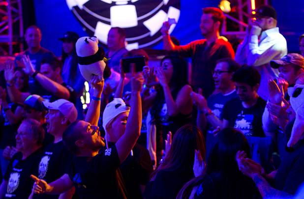 Jay Farber supporters celebrate as Farber wins a hand against Ryan Riess, 23, a poker professional from East Lansing, Mich., during the final table of the World Series of Poker $10,000 buy-in no-limit Texas Hold 'Em tournament at the Rio Monday, Nov. 4, 2013.