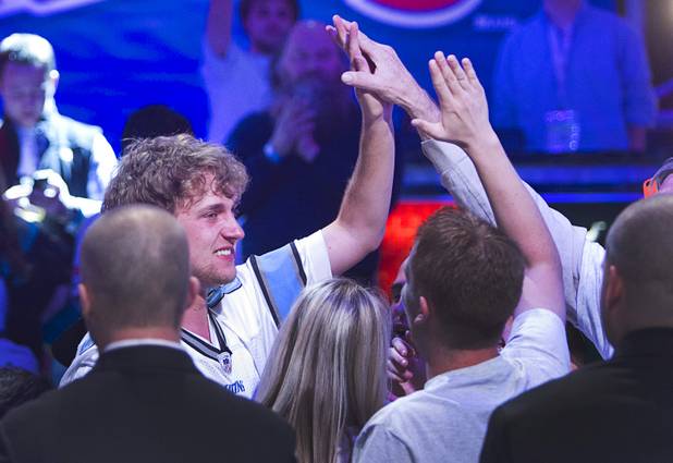 Ryan Riess, 23, a poker professional from East Lansing, Mich., celebrates after the winning the World Series of Poker $10,000 buy-in no-limit Texas Hold 'Em tournament at the Rio Tuesday, Nov. 5, 2013.
