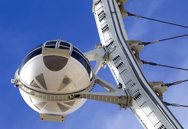 A cabin is shown attached to the 550-foot tall High Roller, the world's tallest observation wheel, under construction near the Las Vegas Strip and Flamingo Road Thursday, Nov. 7, 2013. The wheel is the centerpiece of the Linq project, a $550 million outdoor retail, dining and entertainment district being developed by Caesars Entertainment Corp. The High Roller will feature 28 cabins that will each hold 40 passengers.
