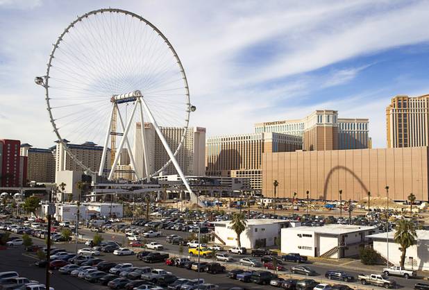 Cabins are shown attached to the 550-foot tall High Roller, the world's tallest observation wheel, under construction near the Las Vegas Strip and Flamingo Road Thursday, Nov. 7, 2013. The wheel is the centerpiece of the Linq project, a $550 million outdoor retail, dining and entertainment district being developed by Caesars Entertainment Corp. The High Roller will feature 28 cabins that will each hold 40 passengers.